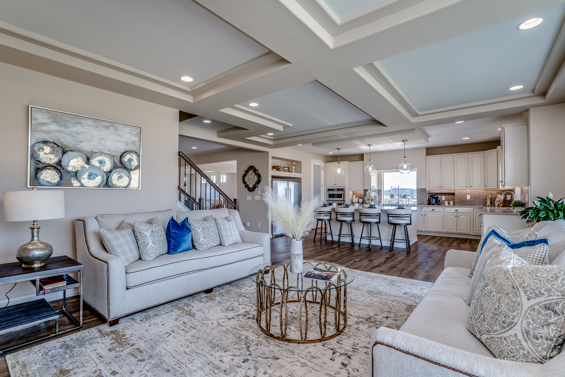 Open concept living room and kitchen in a Banning Lewis Ranch home