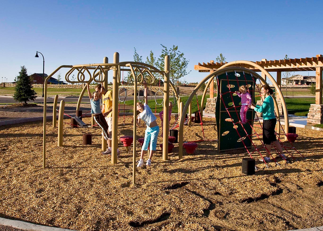 Family enjoying a park in Banning Lewis Ranch, Colorado Springs